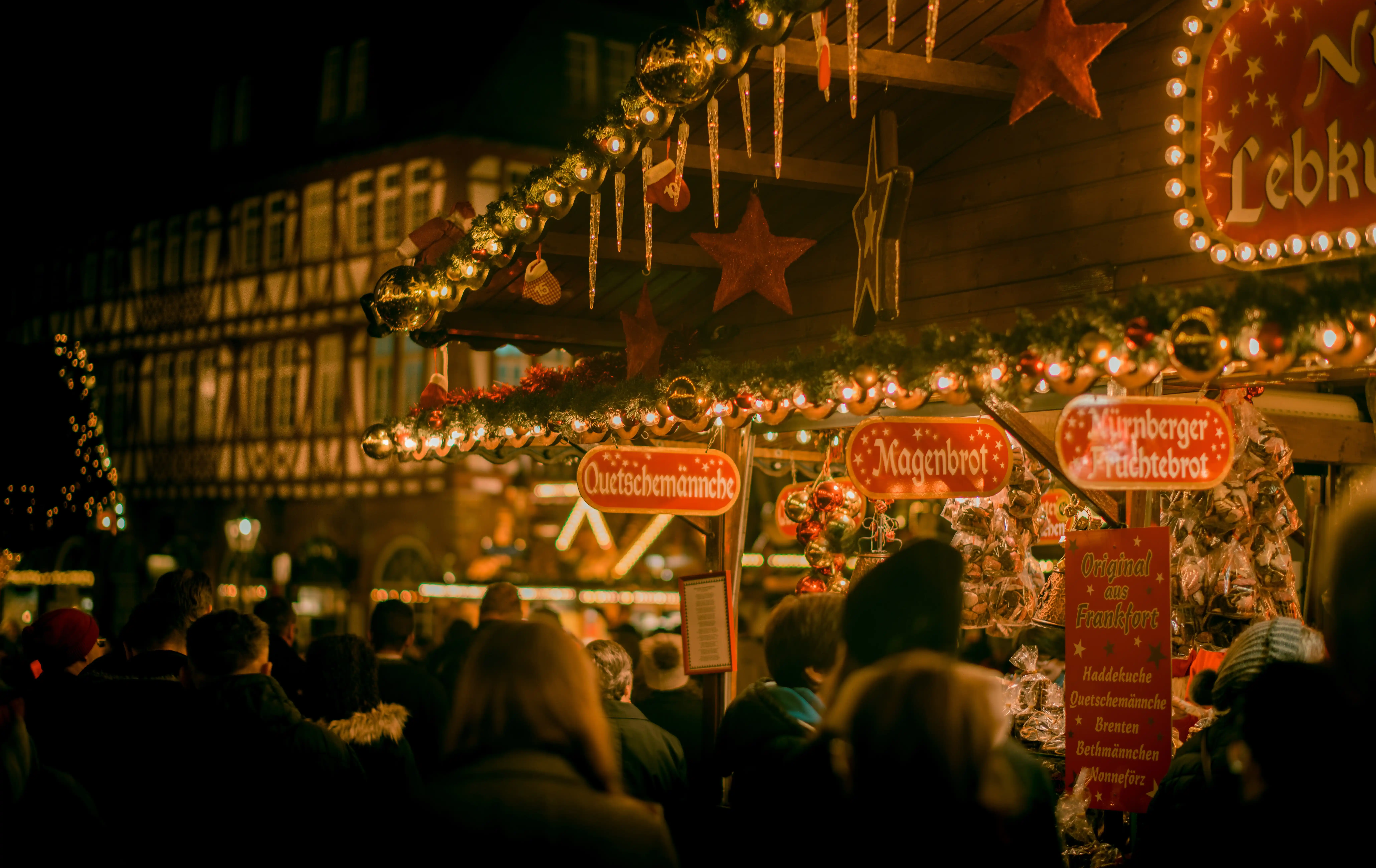 German Christmas Market with Crowd at Night